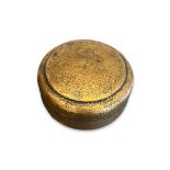 AN ISLAMIC BRASS BOX AND COVER WITH CALLIGRAPHIC TEXT
