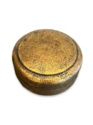 AN ISLAMIC BRASS BOX AND COVER WITH CALLIGRAPHIC TEXT
