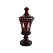 A LATE 19TH / EARLY 20TH CENTURY BOHEMIAN RUBY GLASS CUP AND COVER