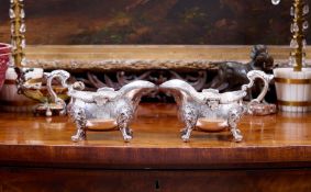 PAUL DE LAMERIE: AN IMPORTANT PAIR OF STERLING SILVER SAUCE BOATS, C. 1737