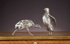 A PAIR OF DUTCH SILVER AND SILVER GILT MODELS OF QUAILS