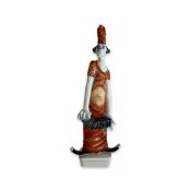 MEISSEN: A PORCELAIN CLOWN WITH ACCORDIAN DESIGNED BY PETER STRANG