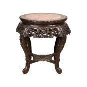 A 19TH CENTURY CHINESE CARVED HARDWOOD AND MARBLE TOPPED TABLE