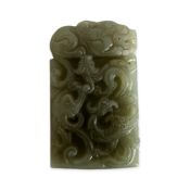 A CHINESE CARVED CELADON JADE DOUBLE SIDED RELIEF