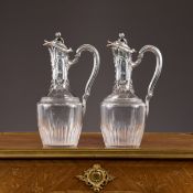 TETARD FRERES: A FINE PAIR OF 19TH CENTURY SILVER AND CRYSTAL GLASS CLARET JUGS CIRCA 1880