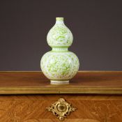 A CHINESE DOUBLE GOURD PORCELAIN AND GREEN ENAMELLED VASE