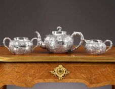 A LATE 19TH CENTURY CHINESE EXPORT SILVER TEA SET, WANG HING & CO.