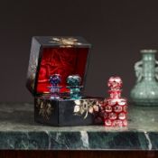 A 19TH CENTURY MOTHER OF PEARL DECANTER BOX WITH COLOURED DECANTERS
