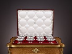 A CASED SET OF TWELVE STERLING SILVER BOWLS RETAILED BY GARRARD & CO. C.1948
