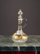 A LATE 19TH / EARLY 20TH CENTURY GILDED GLASS CLARET JUG / DECANTER