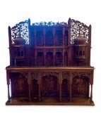 A 19TH CENTURY ANGLO INDIAN CARVED HARDWOOD CABINET