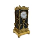 A FINE AND RARE EMPIRE PERIOD GILT AND PATINATED MANTEL CLOCK IN THE STYLE OF THOMIRE