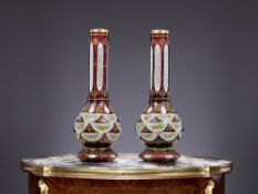A PAIR OF BOHEMIAN FLASHED, ENAMELLED AND GILDED GLASS VASES FOR THE ISLAMIC MARKET