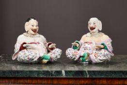A LARGE NEAR PAIR OF 19TH CENTURY PORCELAIN NODDING PAGODA FIGURES