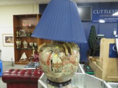 A large Oriental style lamp on stand