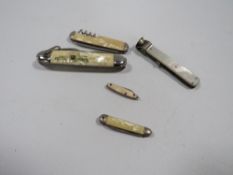 A collection of pocket knives, including a miniature example