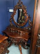A Continental carved dressing table