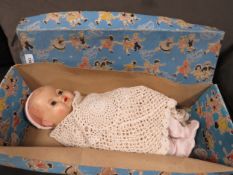 A vintage doll in original box