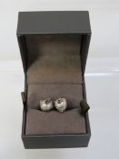 Clogau - a pair of hallmarked silver earrings featuring a cultured pearl encased in a wirework