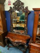 A Continental carved console table with mirror H 235cm W 125 cm