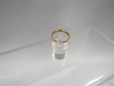 A hallmarked 22 carat gold band approx weight approx weight 3.6g