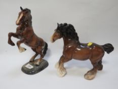 A Beswick rearing cob with a cantering shire (2)