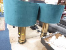 A pair of ex- show home metal effect circulared lamps with crush velvet style shades