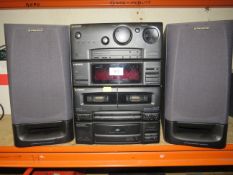 A Pioneer midi Hi-Fi system and speakers