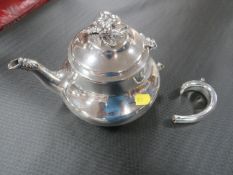 A George III silver tea pot A/F, makers mark JA over IA, London 1813, of low bellied baluster form,