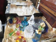 Three trays of assorted glassware to include coloured glass examples
