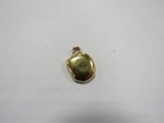 A yellow metal pendant stamped 18ct approx weight 11.6g