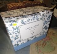 A boxed Laura Ashley limited edition garden tea set together with a picnic hamper and contents