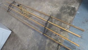 A vintage wood and iron ceiling hanging clothes airer/dryer