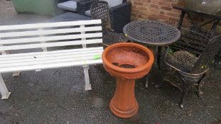 A plastic garden bench patio set ( 2 chairs, table and planter)