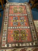 An Eastern woollen rug 193 x 116 cm