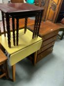 A mahogany four drawer chest together with a vintage kitchen table and two nests of tables