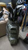 A set of left handed golf clubs comprising Ping woods and Yonex irons plus bag