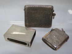 A small hallmarked silver vesta together with a larger example A/F and a hallmarked silver