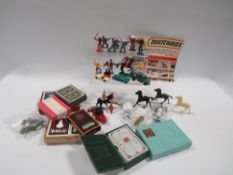 A box of vintage toys to include Cowboys and Indians