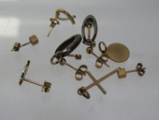 A collection of assorted 9 carat gold earrings etc