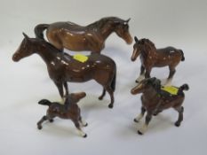 Five assorted Beswick horses and foals - one ear missing from largest horse