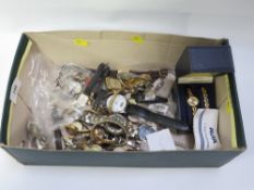 A shoebox containing watches
