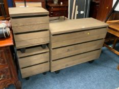 A modern show home chest of three drawers together with a matching pair of bedside chests. (3)