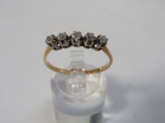 An 18ct and plat five stone old cut diamond ring approx weight 2.7g
