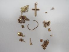 A small bag of assorted yellow metal