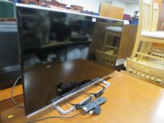 A 40” Panasonic flatscreen television with remote - House Clearance with two pairs of HD glasses