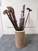 A collection of assorted walking sticks etc