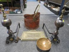 A pair of vintage fire dogs together with a copper coal skuttle etc