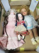 A vintage googly eye doll, together with two vintage bisque head dolls (3)