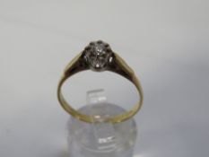 A hallmarked 18 carat gold an illusion set diamond set solitaire ring approx weight 3.2g together